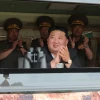 North Koreas Kim calls for stronger offensive military