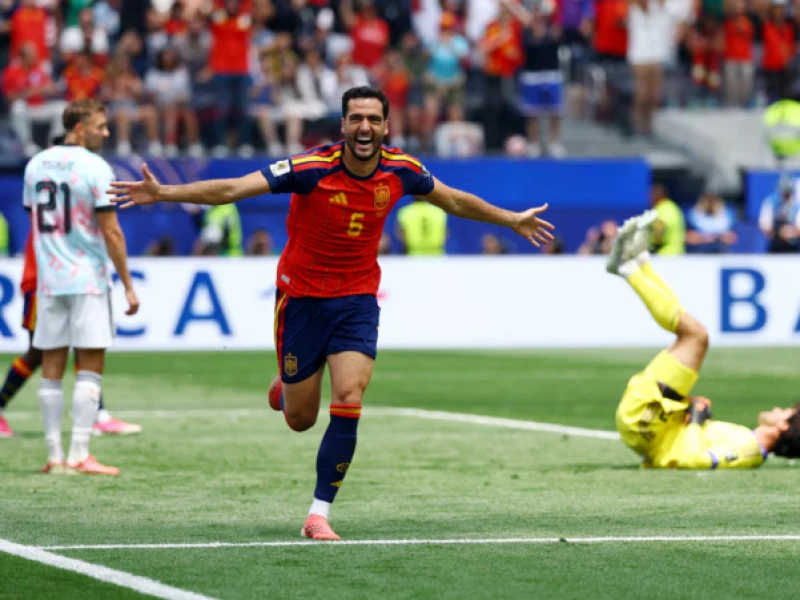 Spain edge Belgium 2-1 as Merino strikes late again