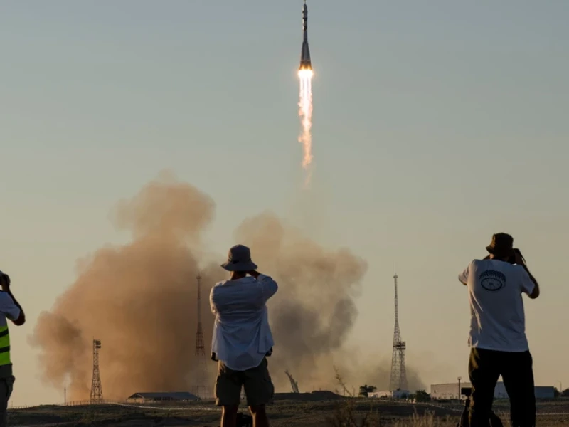 US-Russian crew reaches International Space Station for eight-month mission
