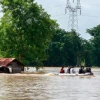 Myanmar rescuers fear 10 dead in cut-off flood zone